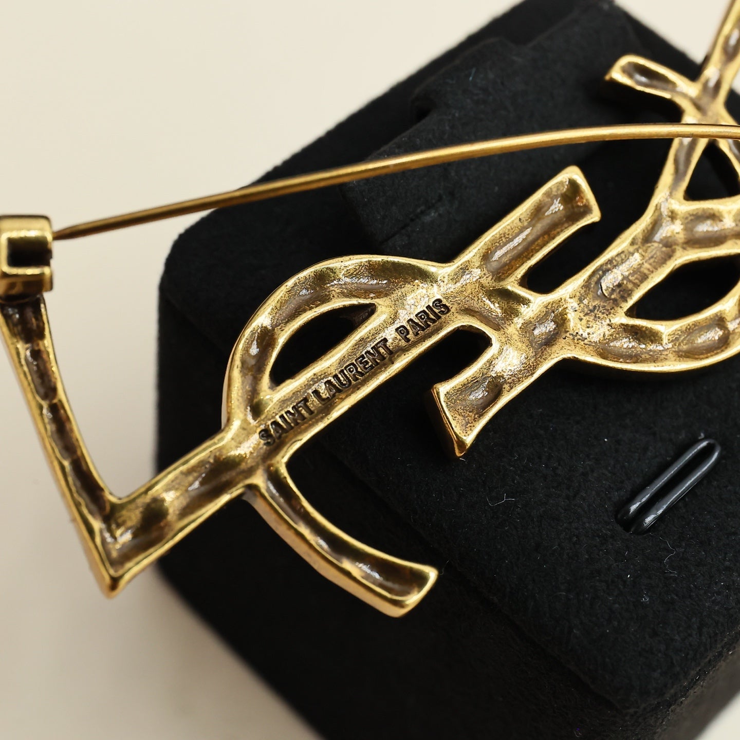 YSL 26S BAMBOO TEXTURED MONOGRAM BROOCH IN GOLD TONE METAL