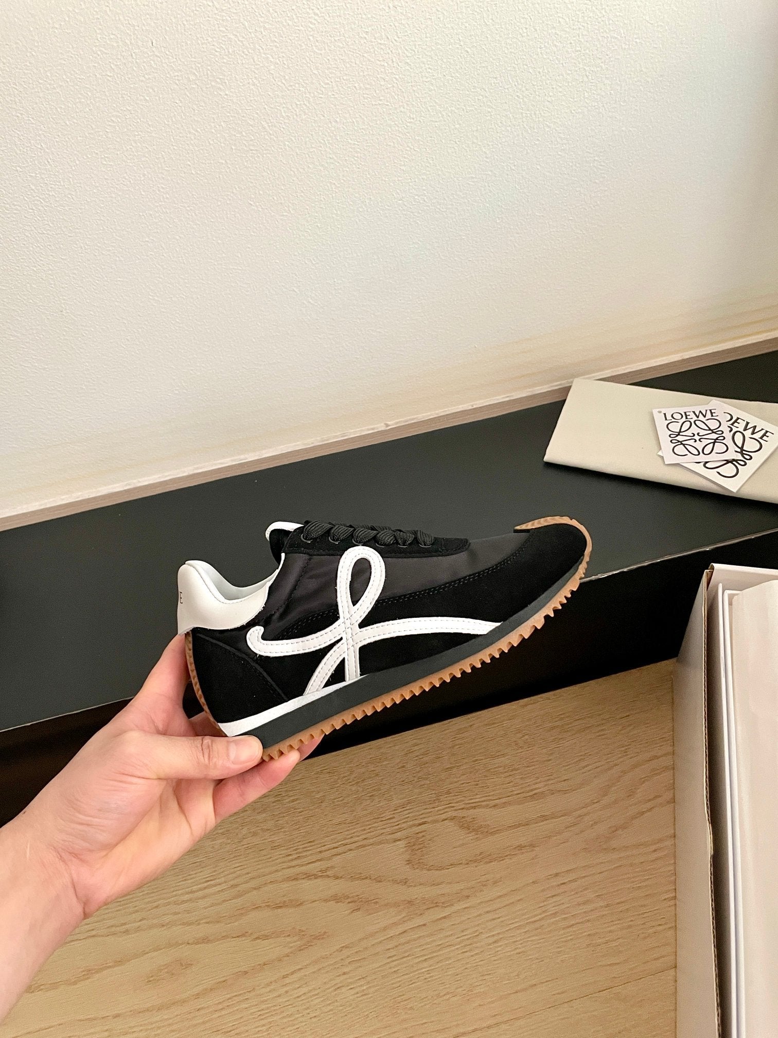 LOEWE 26S FLOW RUNNER SNEAKER IN BLACK SUEDE AND WHITE SHEEPSKIN
