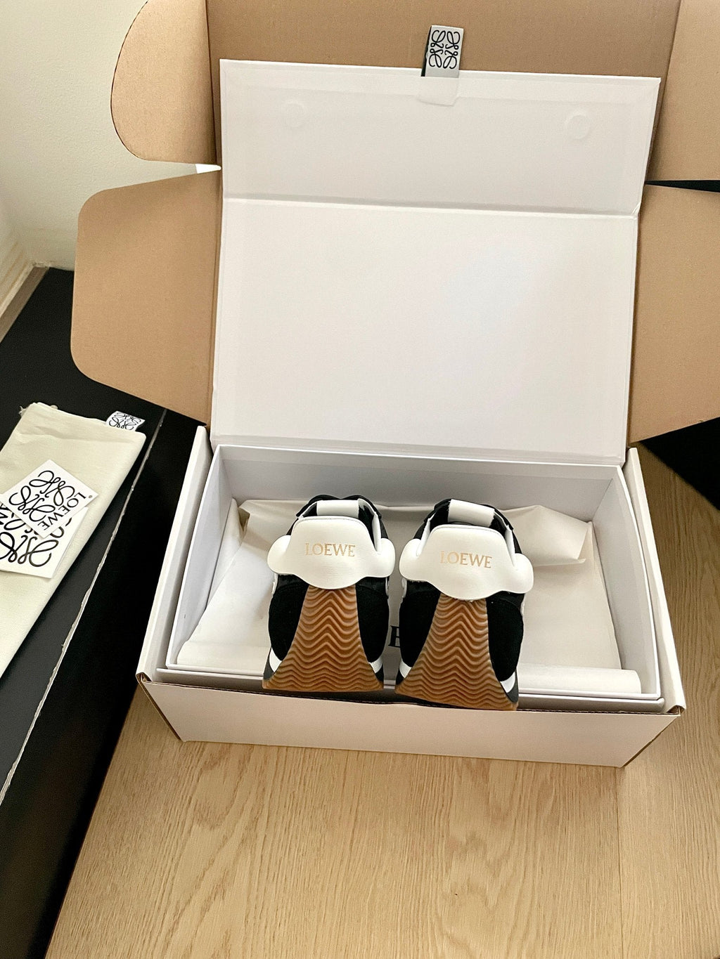 LOEWE 26S FLOW RUNNER SNEAKER IN BLACK SUEDE AND WHITE SHEEPSKIN