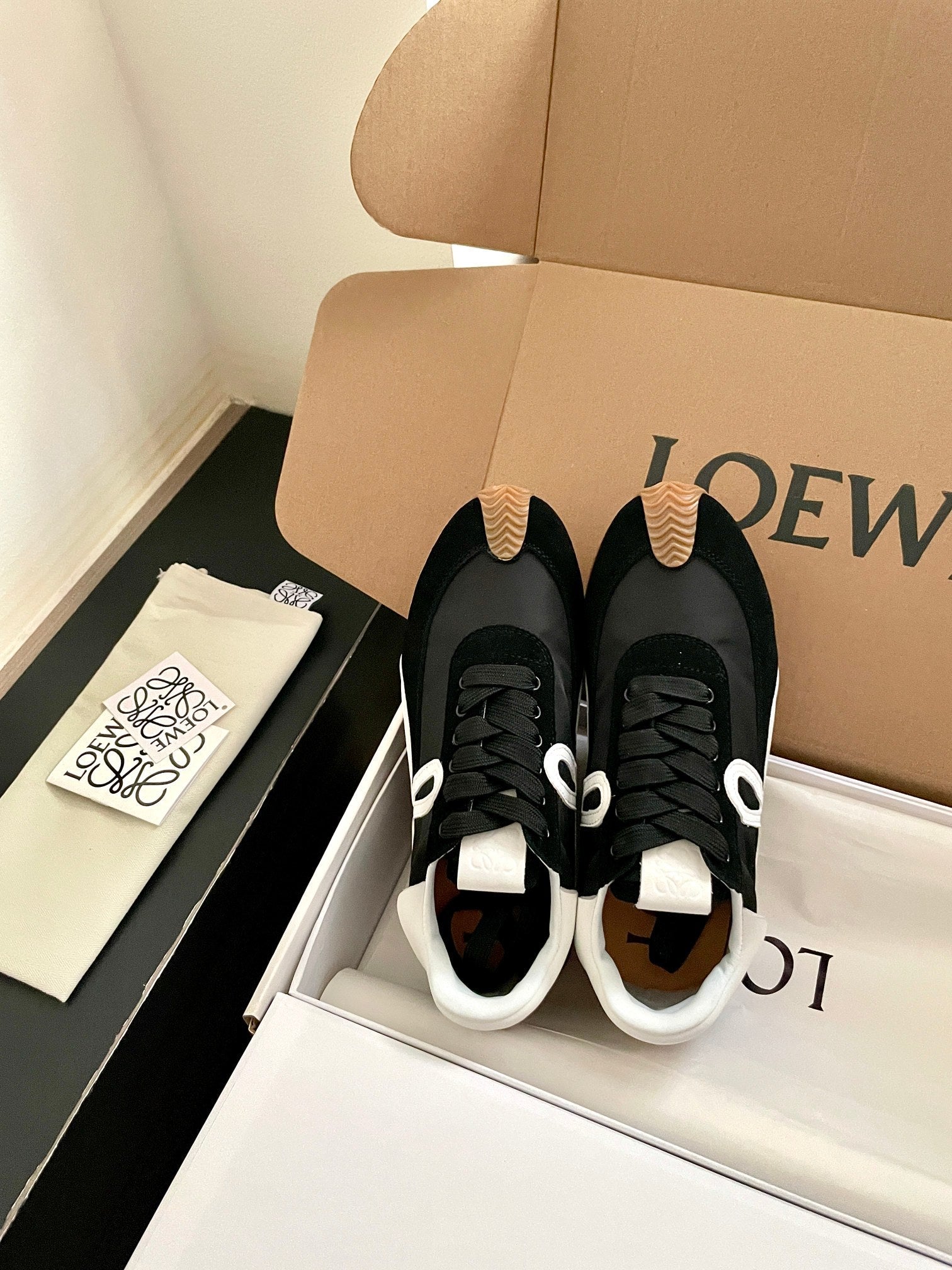 LOEWE 26S FLOW RUNNER SNEAKER IN BLACK SUEDE AND WHITE SHEEPSKIN