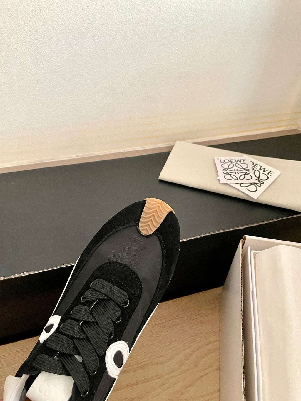 LOEWE 26S FLOW RUNNER SNEAKER IN BLACK SUEDE AND WHITE SHEEPSKIN