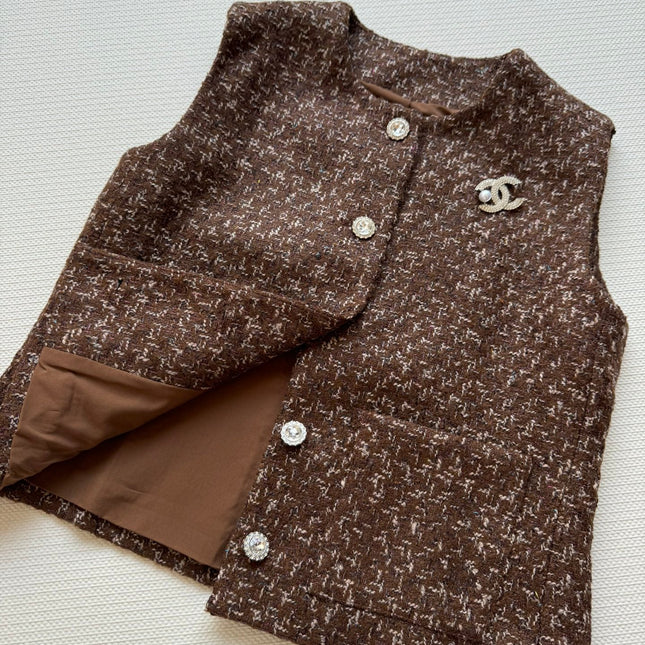 CHANEL 26S SLEEVELESS BLAZER 712