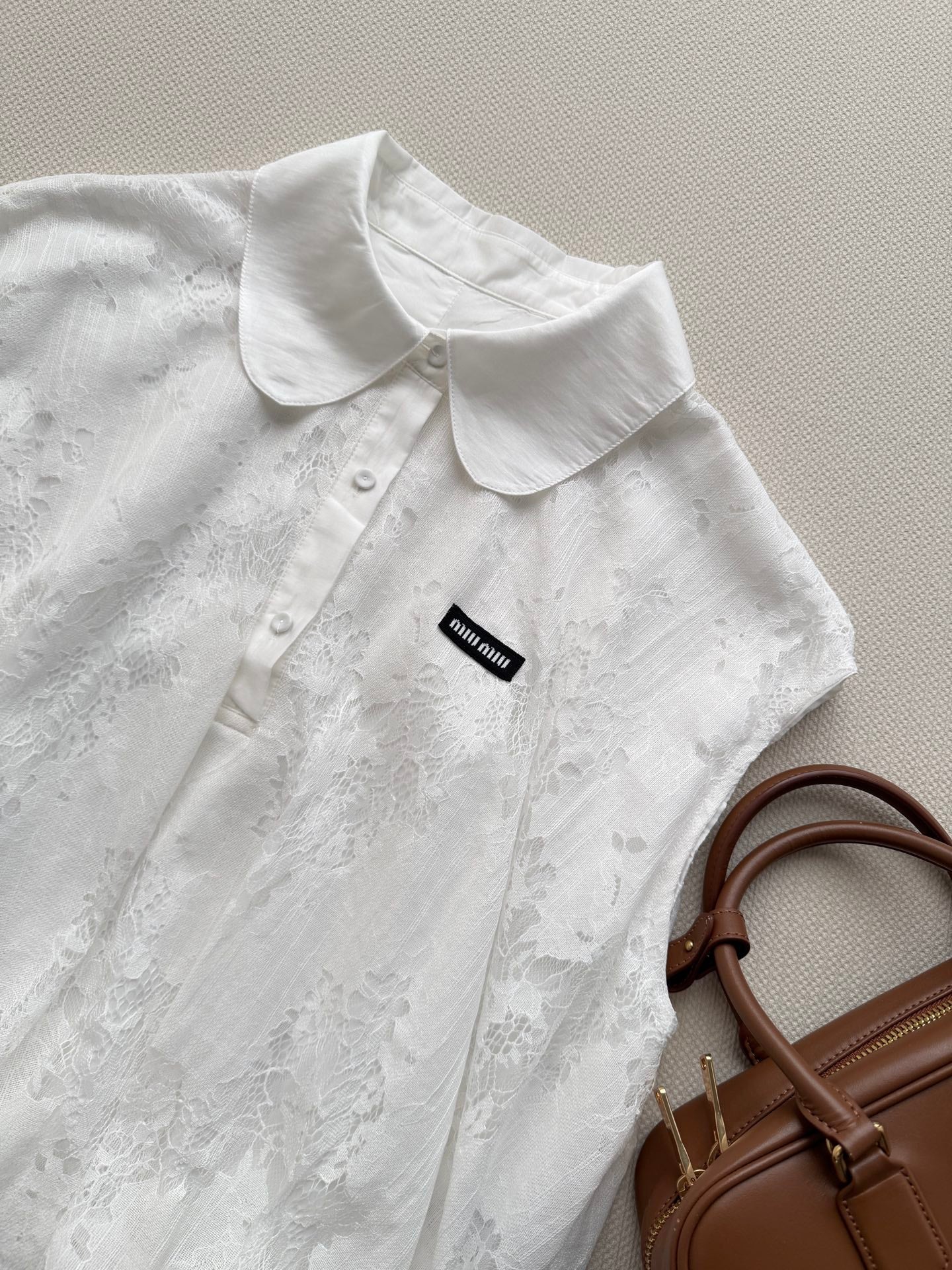 MIUMIU 26S SLEEVELESS POLO TOP 1228