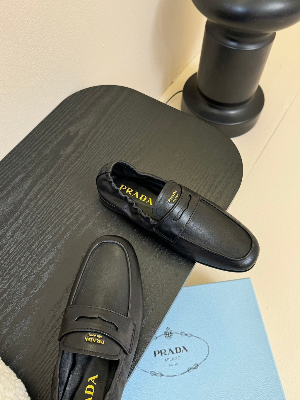 PRADA 25S SHUFFLE LOAFERS IN BLACK CALFSKIN
