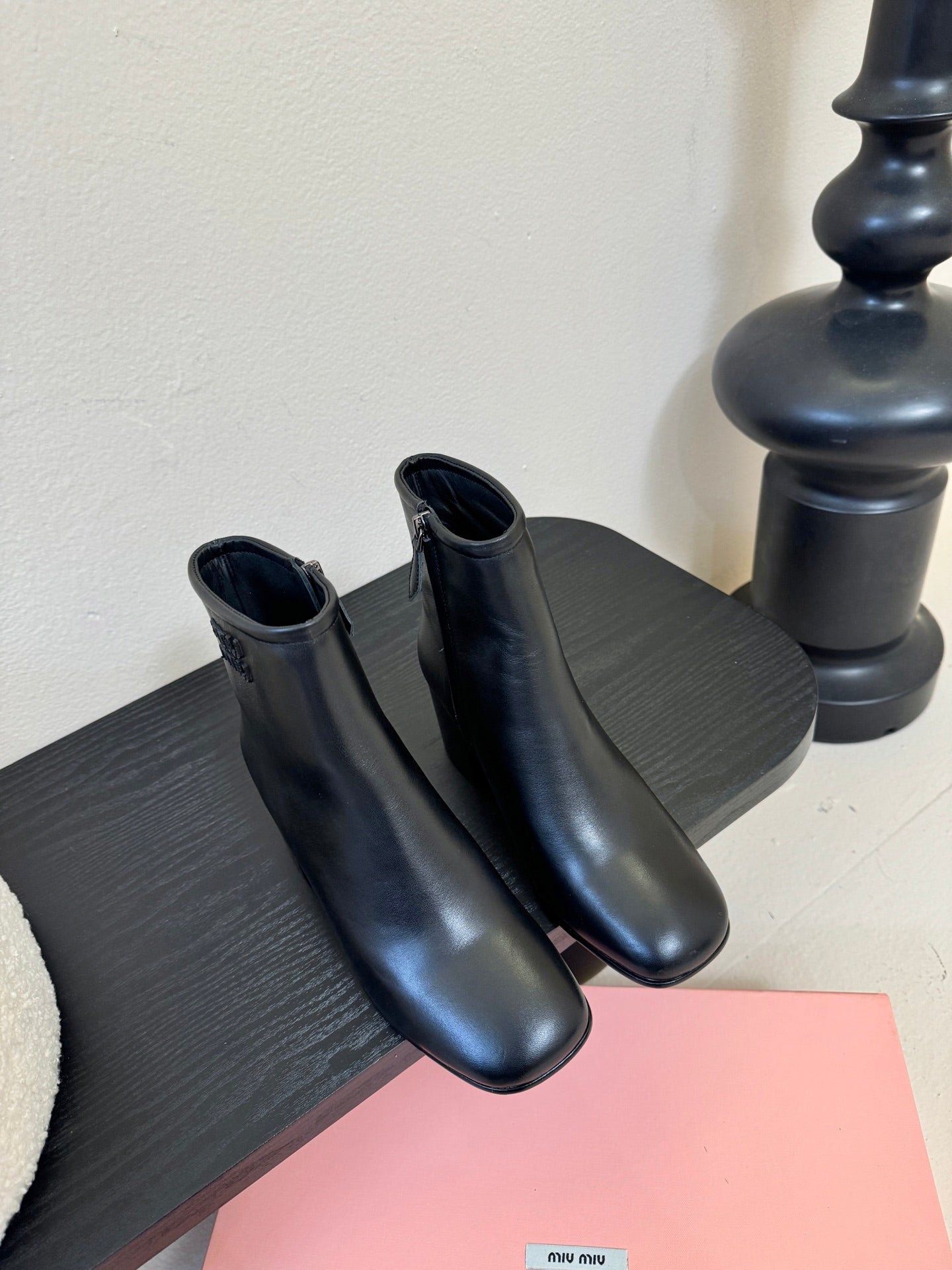 MIUMIU 25S ANKLE BOOTS 65MM IN BLACK CALFSKIN