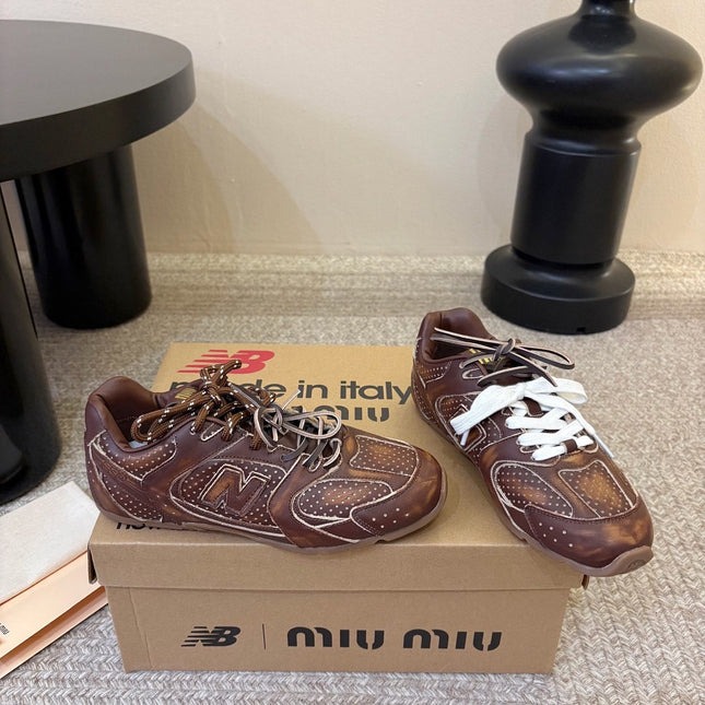 MIUMIU 26S PERFORATED SNEAKERS IN DARK BROWN CALFSKIN