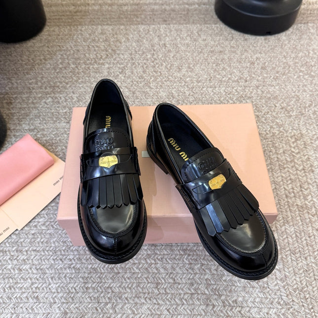 MIUMIU 26S FRINGE PENNY LOAFERS IN BLACK CALFSKIN