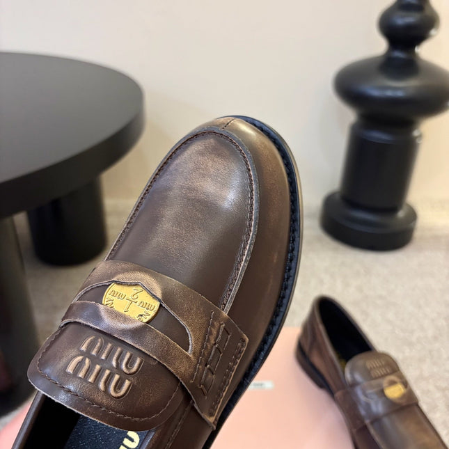 MIUMIU 26S COIN PENNY LOAFERS IN DARK BROWN CALFSKIN