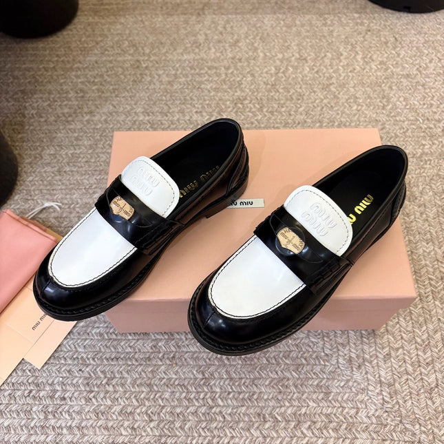 MIUMIU 26S COIN PENNY LOAFERS IN BLACK MIX WHITE CALFSKIN