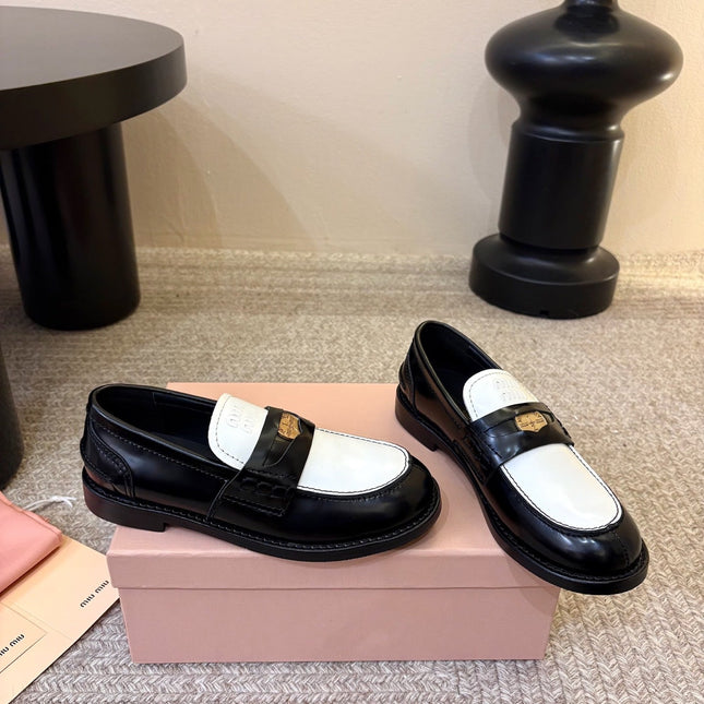 MIUMIU 26S COIN PENNY LOAFERS IN BLACK MIX WHITE CALFSKIN