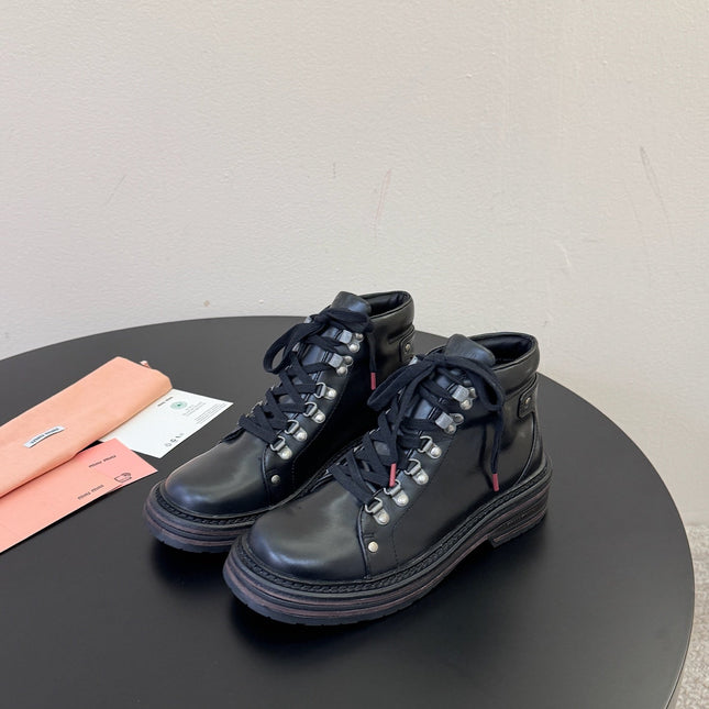 MIUMIU 26S ANKLE MOUNTAIN BOOTS IN BLACK CALFSKIN