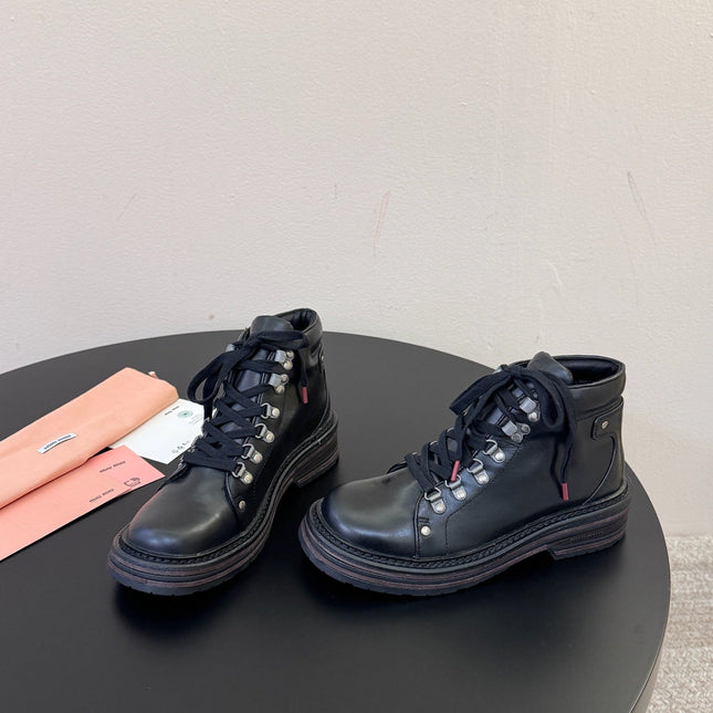 MIUMIU 26S ANKLE MOUNTAIN BOOTS IN BLACK CALFSKIN