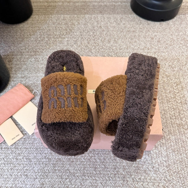 MIUMIU 26S PLATFORM SLIDES IN DARK BROWN SHEARLING