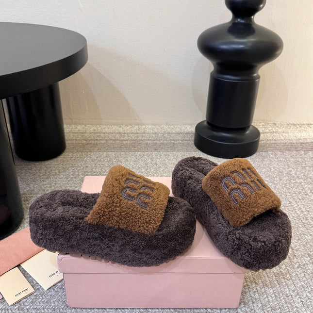 MIUMIU 26S PLATFORM SLIDES IN DARK BROWN SHEARLING