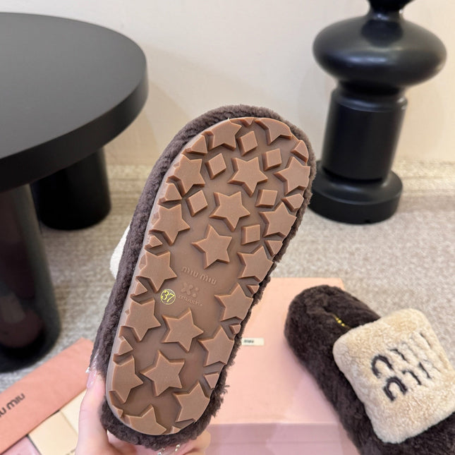 MIUMIU 26S PLATFORM SLIDES IN DARK BROWN AND BEIGE SHEARLING