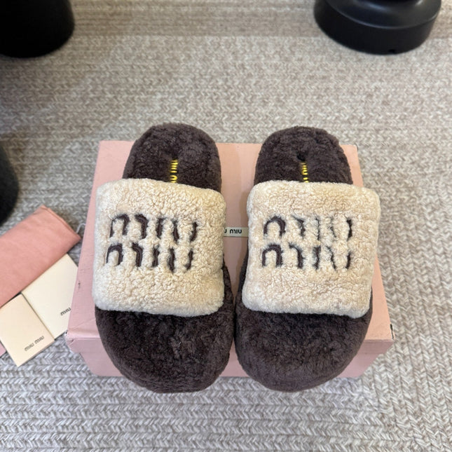 MIUMIU 26S PLATFORM SLIDES IN DARK BROWN AND BEIGE SHEARLING