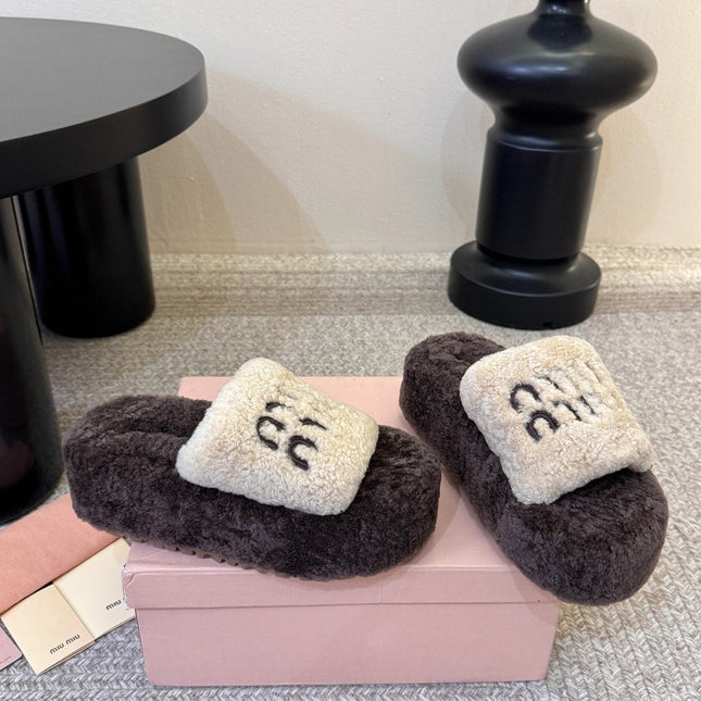 MIUMIU 26S PLATFORM SLIDES IN DARK BROWN AND BEIGE SHEARLING