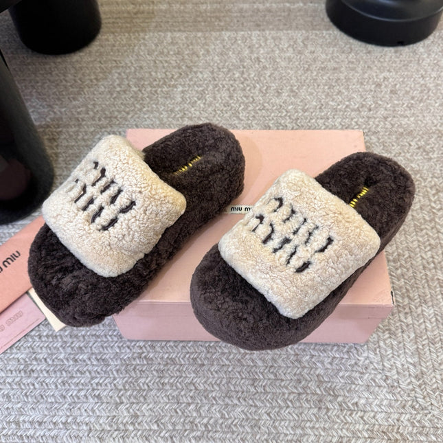 MIUMIU 26S PLATFORM SLIDES IN DARK BROWN AND BEIGE SHEARLING