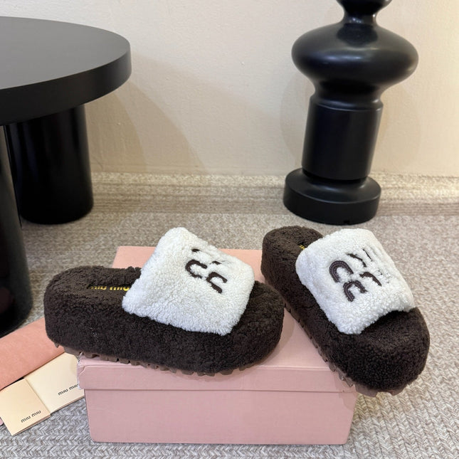 MIUMIU 26S PLATFORM SLIDES IN DARK BROWN AND WHITE SHEARLING