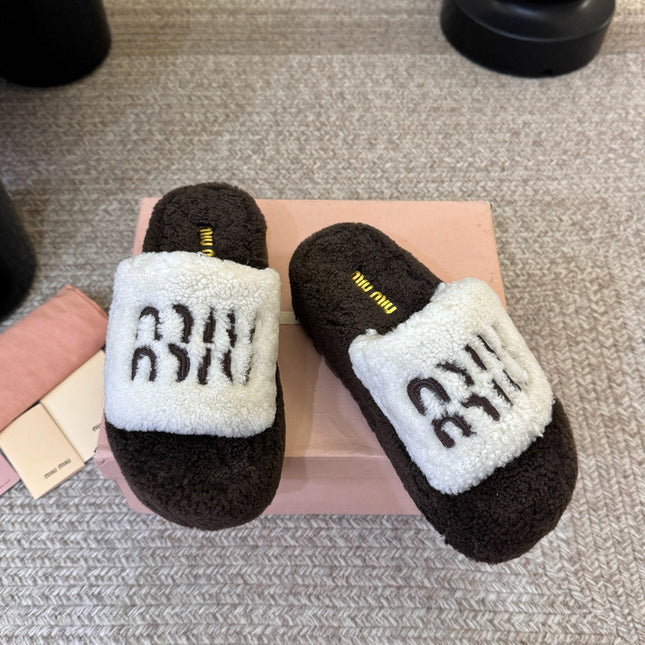 MIUMIU 26S PLATFORM SLIDES IN DARK BROWN AND WHITE SHEARLING