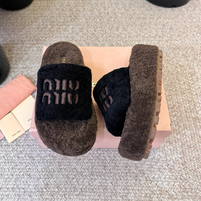 MIUMIU 26S PLATFORM SLIDES IN DARK BROWN AND BLACK SHEARLING