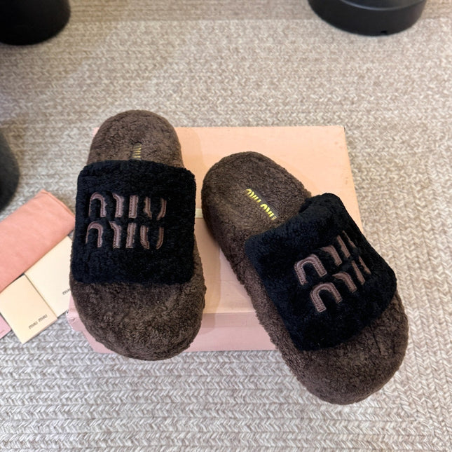 MIUMIU 26S PLATFORM SLIDES IN DARK BROWN AND BLACK SHEARLING