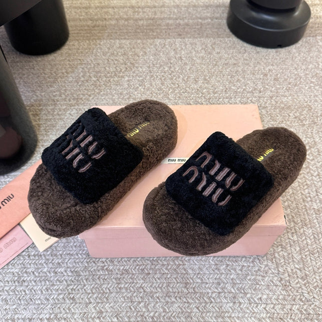 MIUMIU 26S PLATFORM SLIDES IN DARK BROWN AND BLACK SHEARLING
