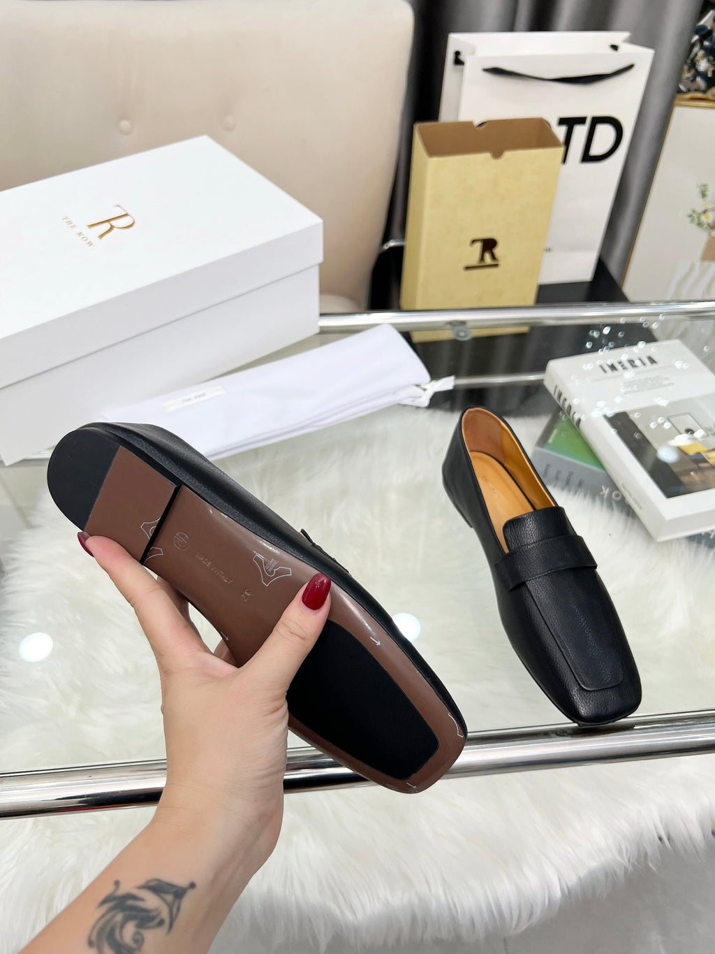 THE ROW 26S PENNY LOAFER FLATS IN BLACK GRAINED CALFSKIN