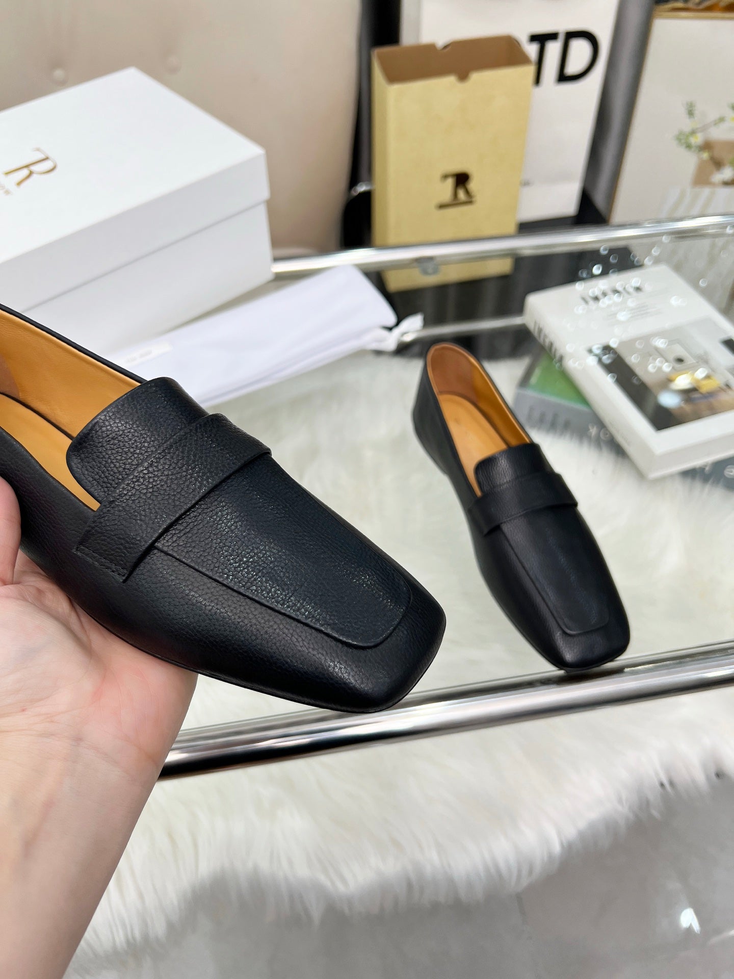 THE ROW 26S PENNY LOAFER FLATS IN BLACK GRAINED CALFSKIN