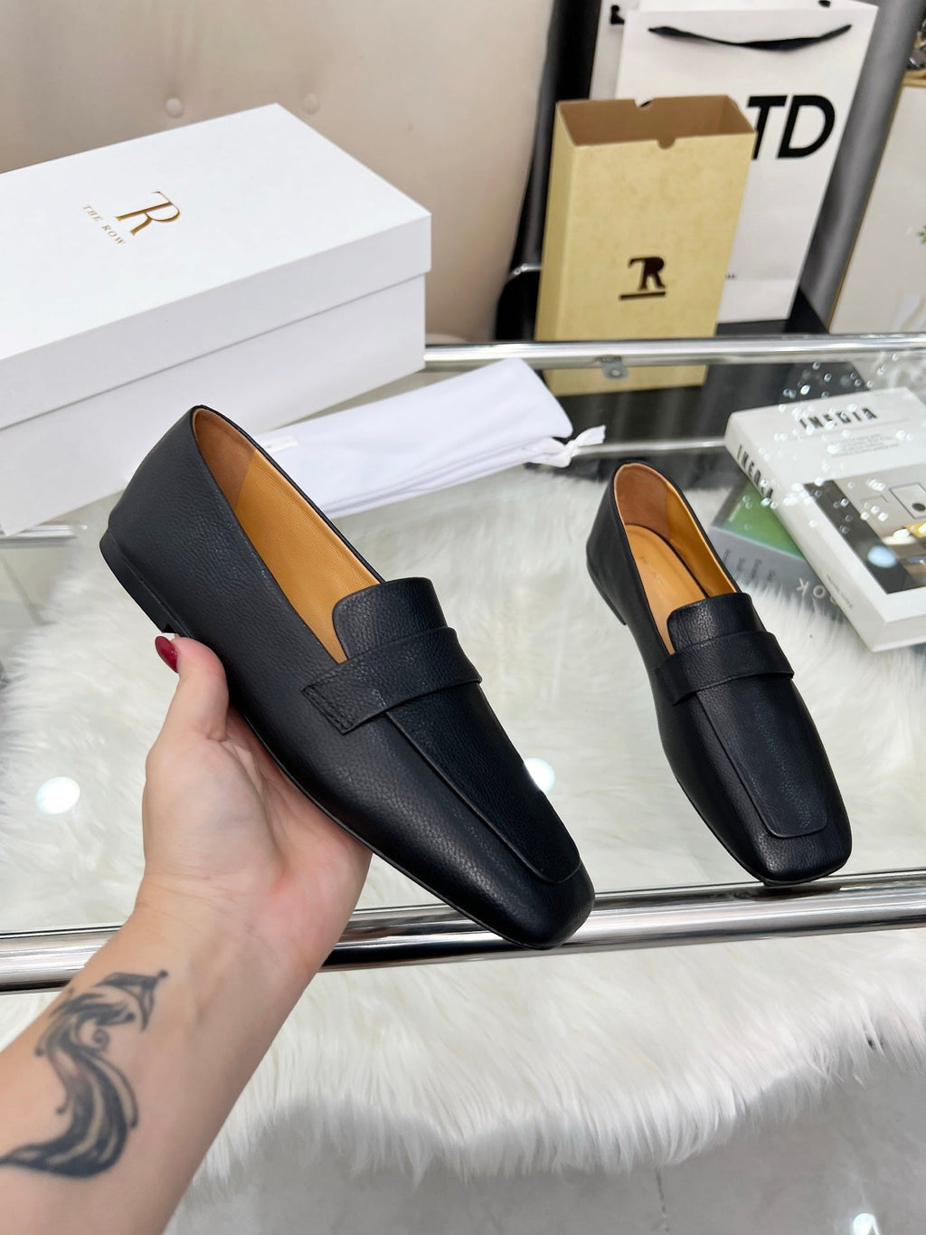 THE ROW 26S PENNY LOAFER FLATS IN BLACK GRAINED CALFSKIN