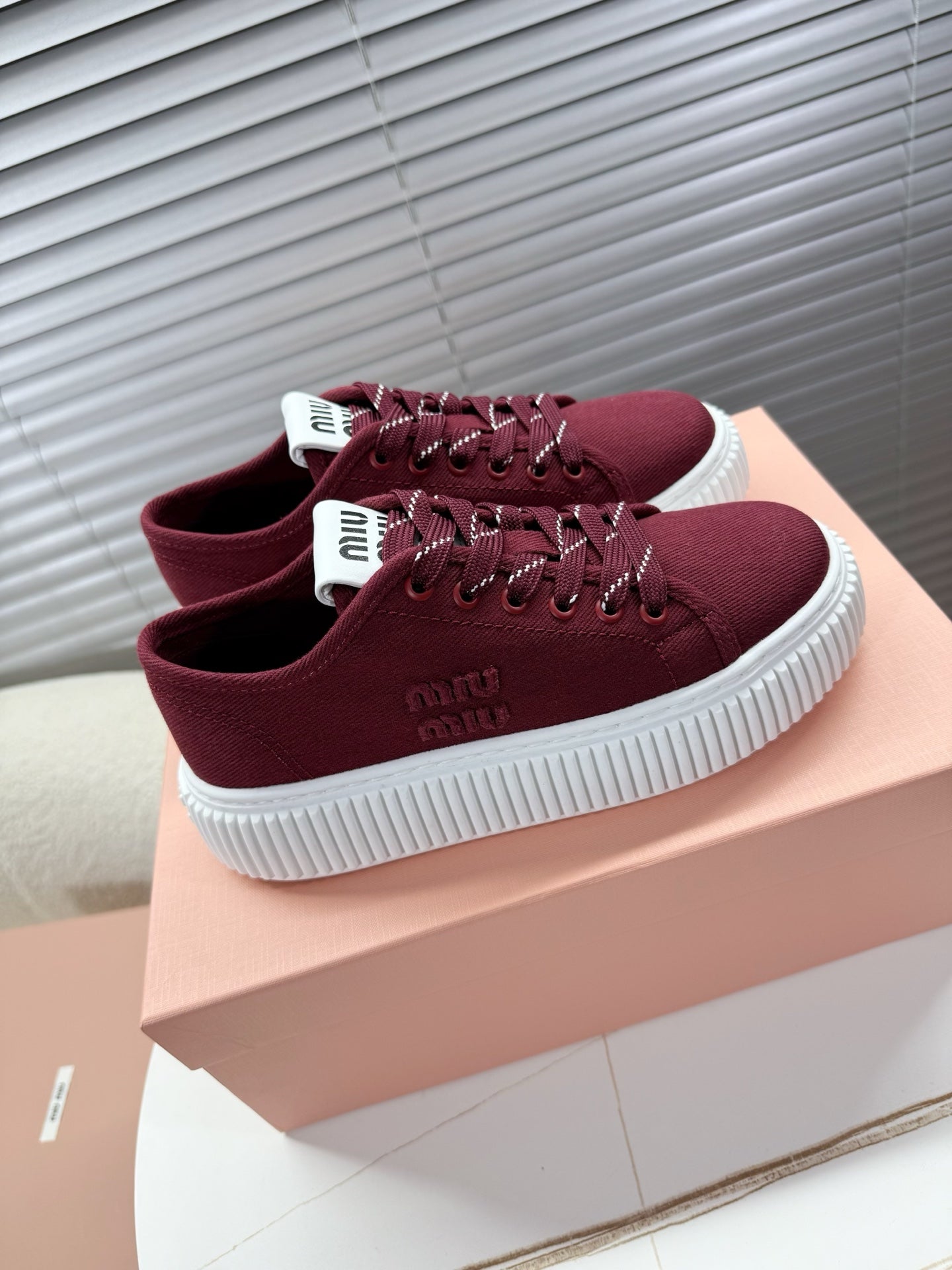 MIUMIU 26S PLATFORM SNEAKERS IN DARK RED CANVAS