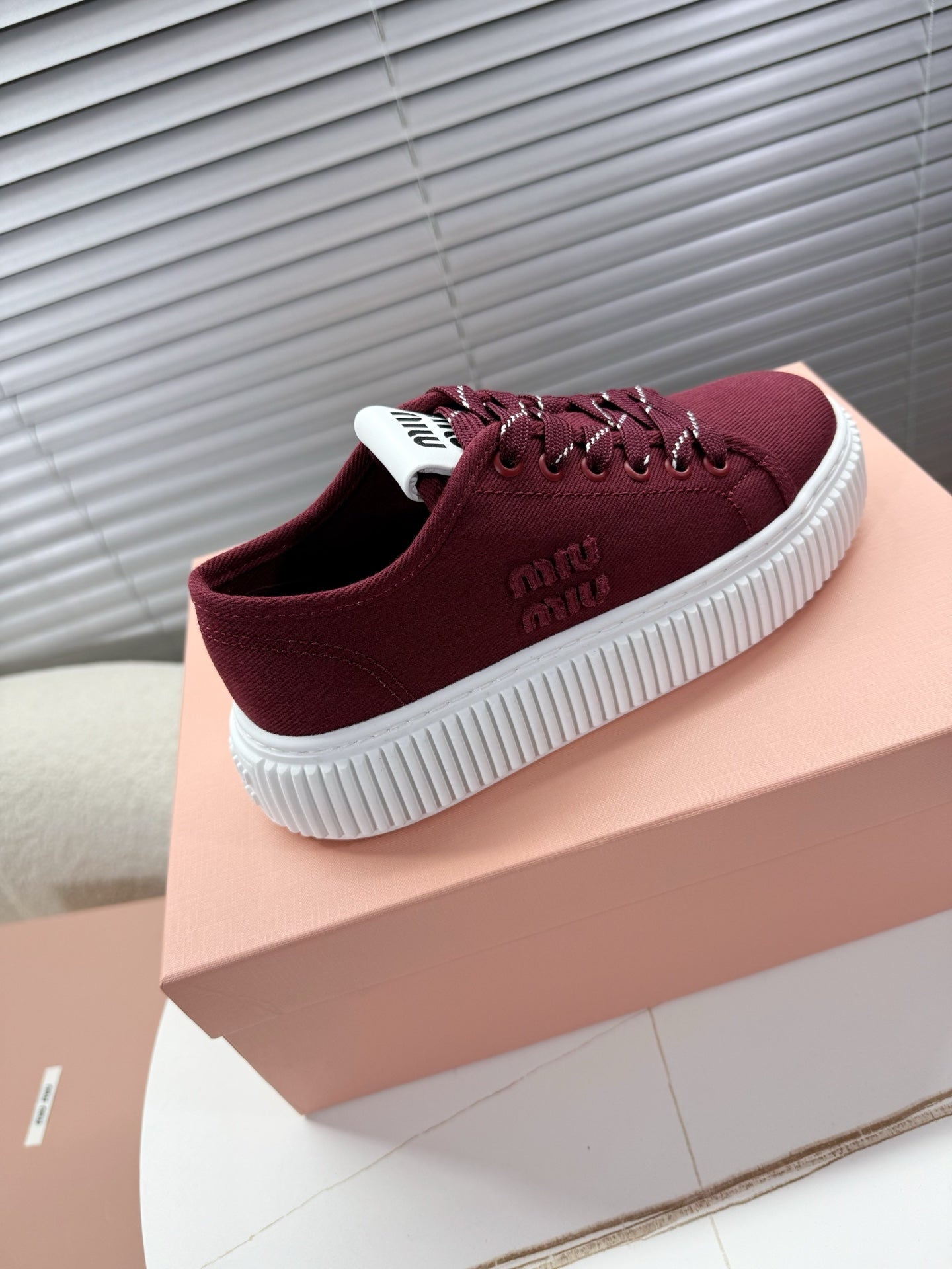 MIUMIU 26S PLATFORM SNEAKERS IN DARK RED CANVAS