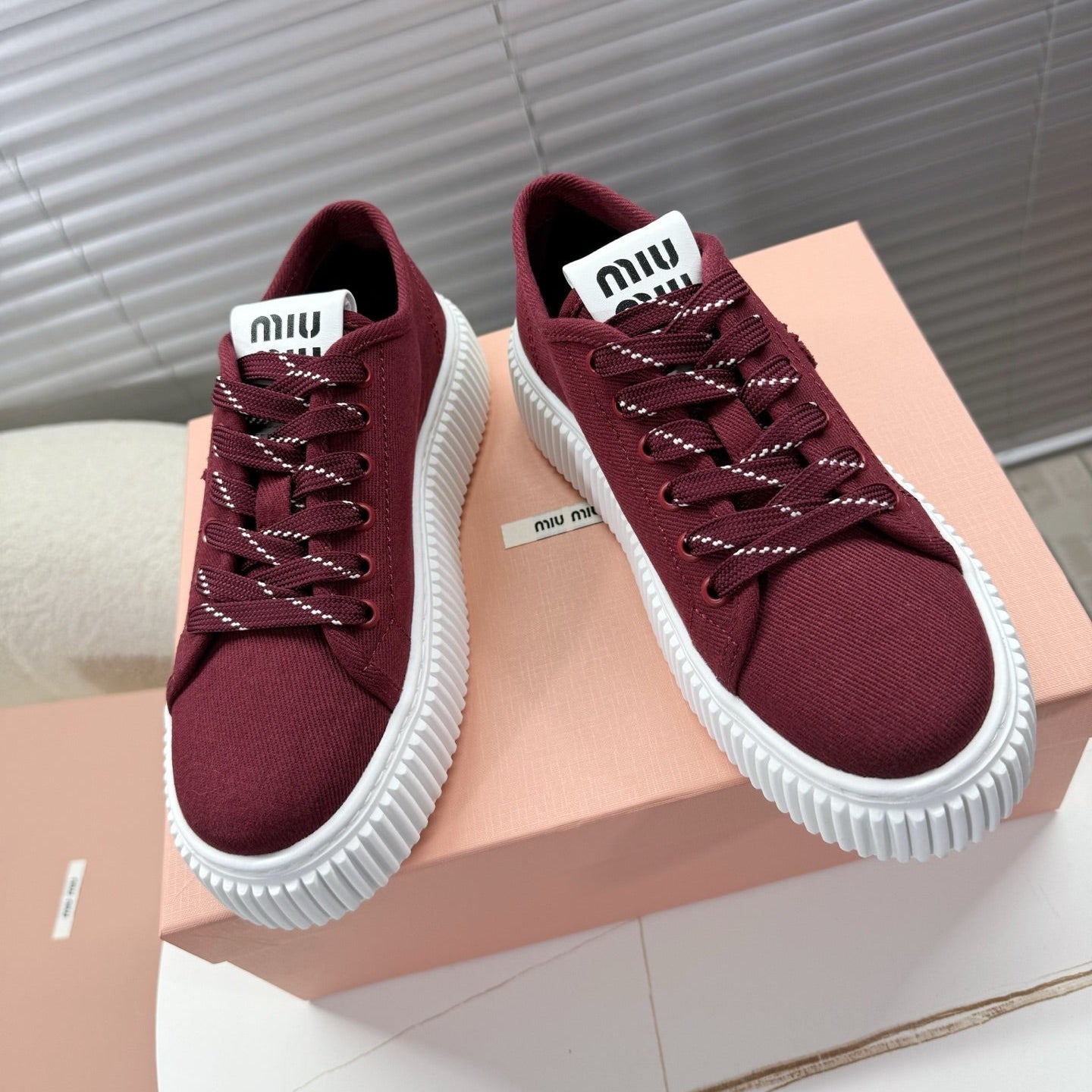 MIUMIU 26S PLATFORM SNEAKERS IN DARK RED CANVAS