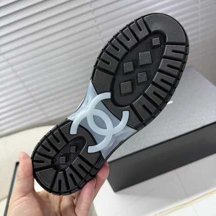 CHANEL 25S SNEAKERS 35MM IN BLACK AND WHITE CALFSKIN