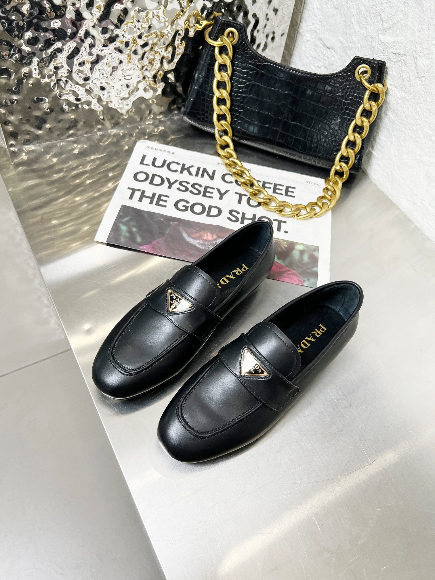 PRADA 26S CLASSIC LOAFERS IN BLACK CALFSKIN WITH LOGO