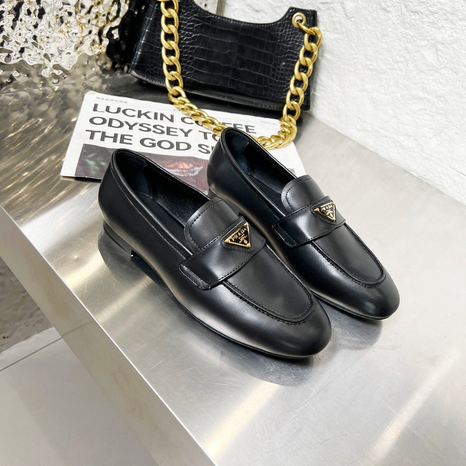 PRADA 26S CLASSIC LOAFERS IN BLACK CALFSKIN WITH LOGO
