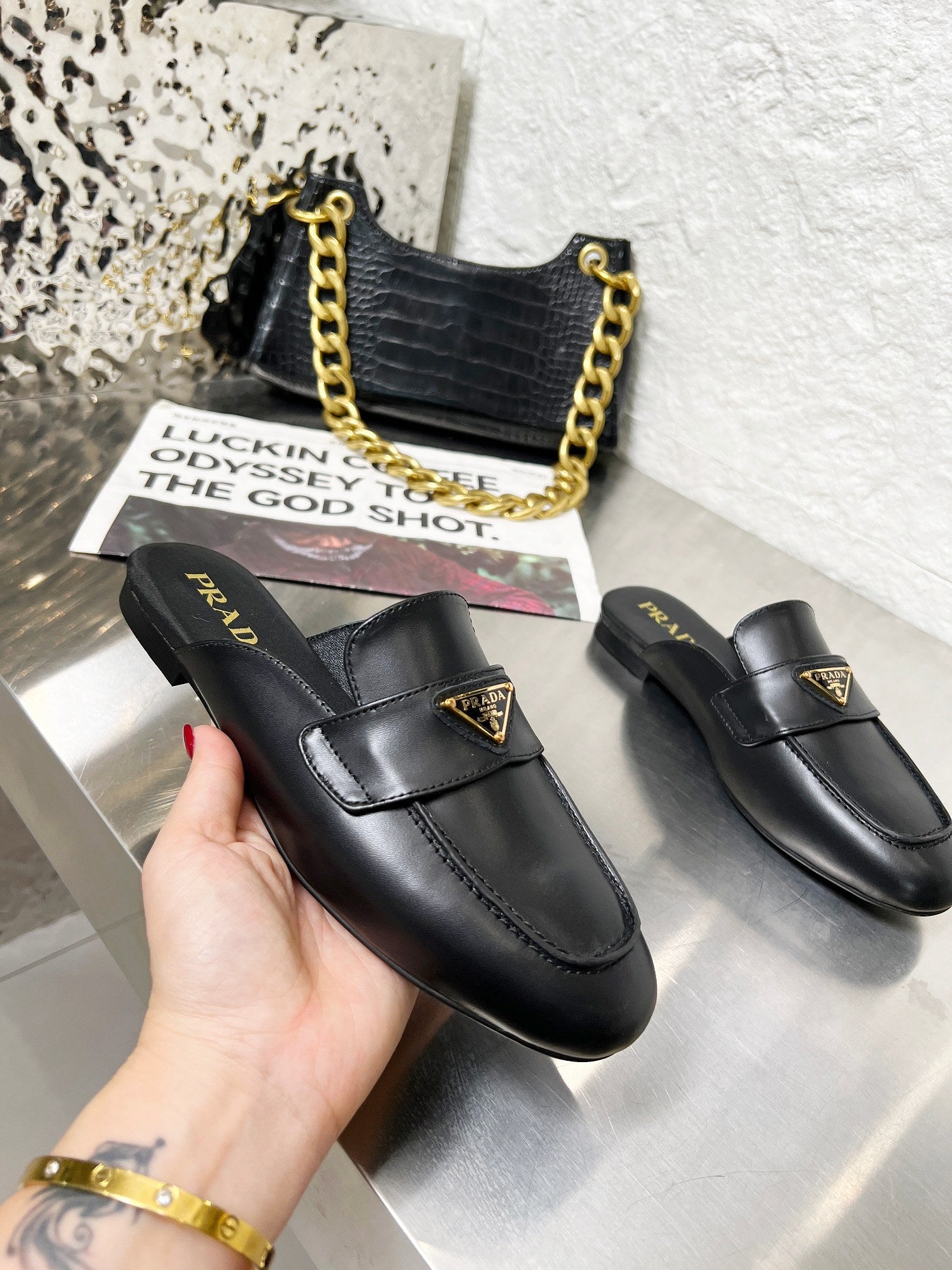 PRADA 26S MULE LOAFERS IN BLACK CALFSKIN WITH LOGO