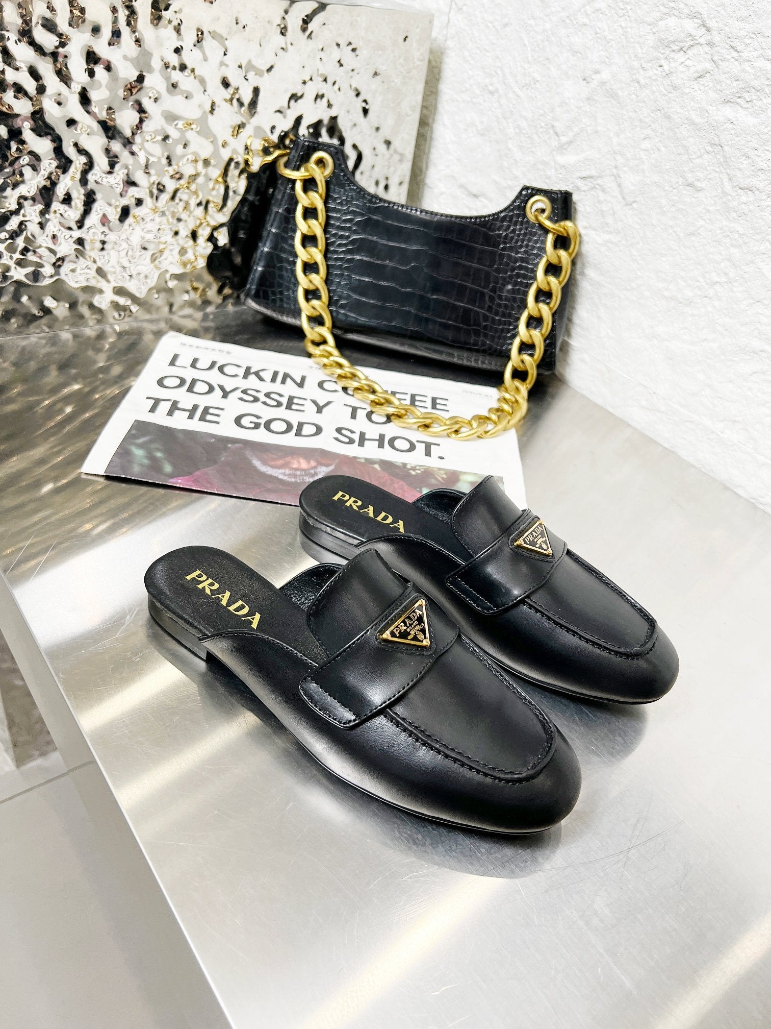 PRADA 26S MULE LOAFERS IN BLACK CALFSKIN WITH LOGO