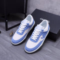 CC BLUE WHITE SUEDE LOW TOP SNEAKERS