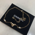 CHANEL 26S DOUBLE C LOGO PEARL & HEART CHARM NECKLACE IN GOLD METAL 631004