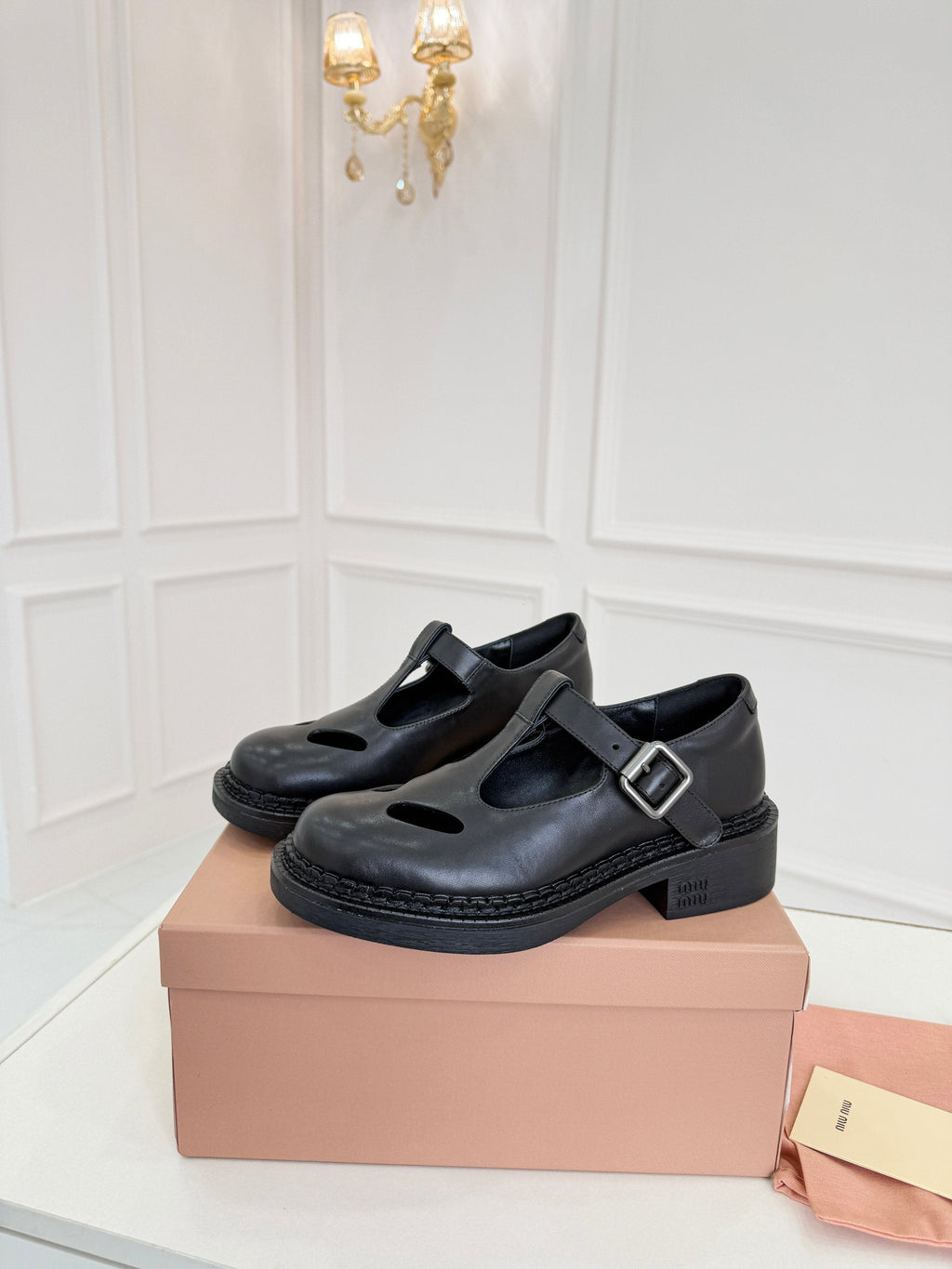 MIUMIU 26S SANDAL 35MM IN BLACK CALFSKIN WITH STYLIZED T-STRING