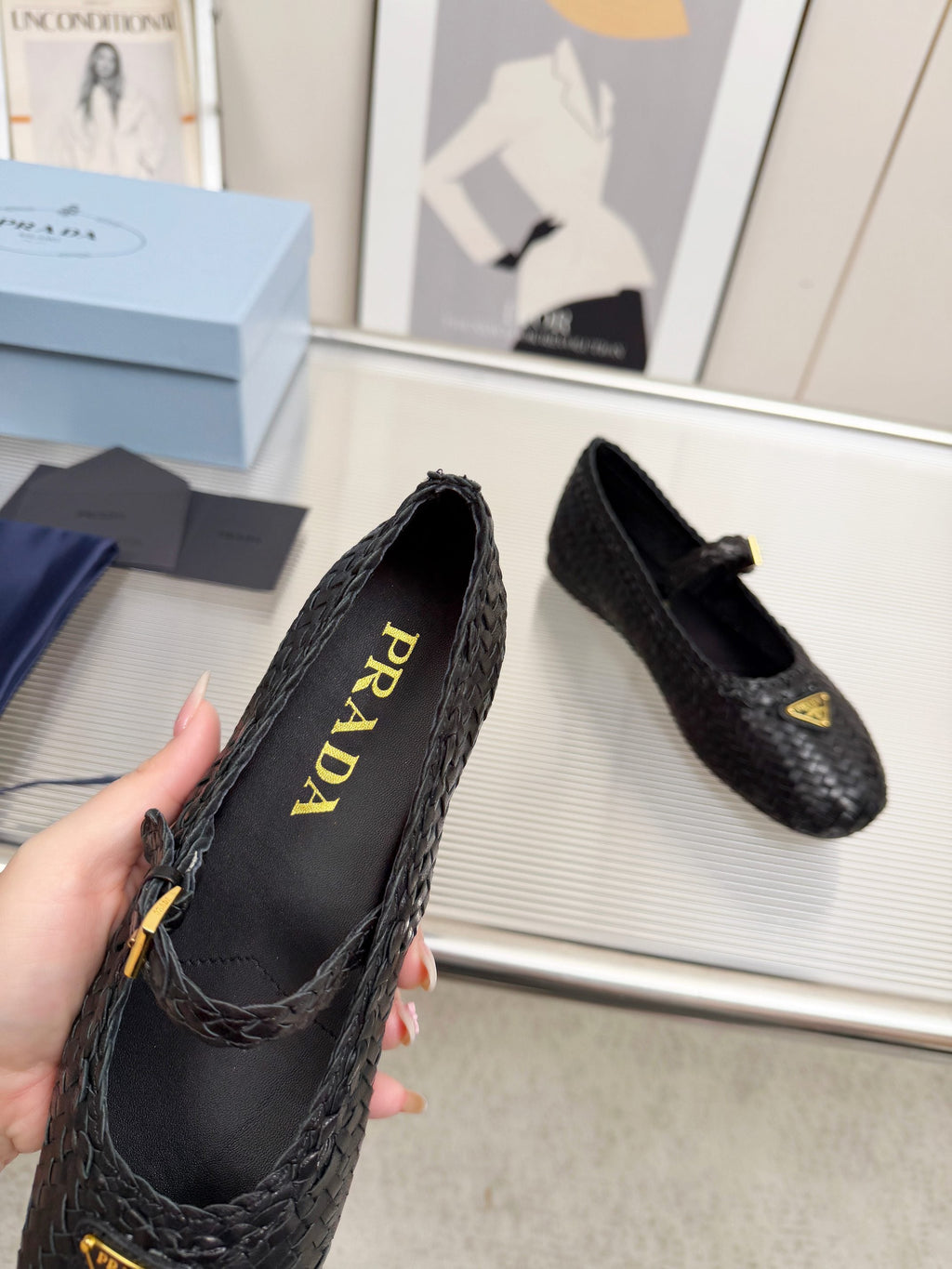 PRADA 26S MARY JANE FLATS IN BLACK WOVEN CALFSKIN