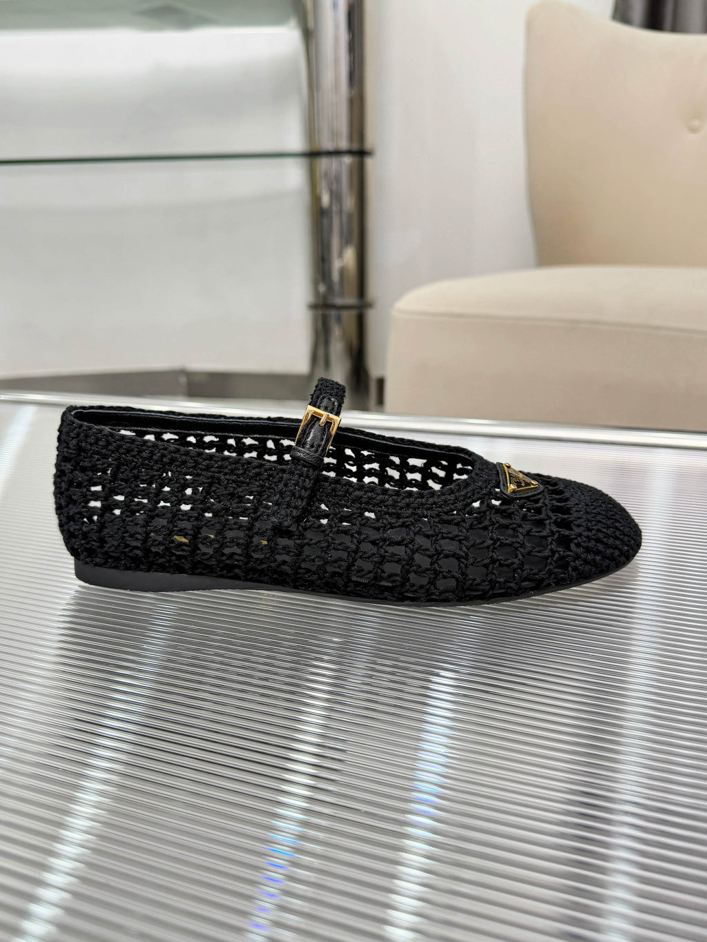 PRADA 26S MARY JANE FLATS IN BLACK WOVEN RAFFIA WITH TRIANGLE LOGO