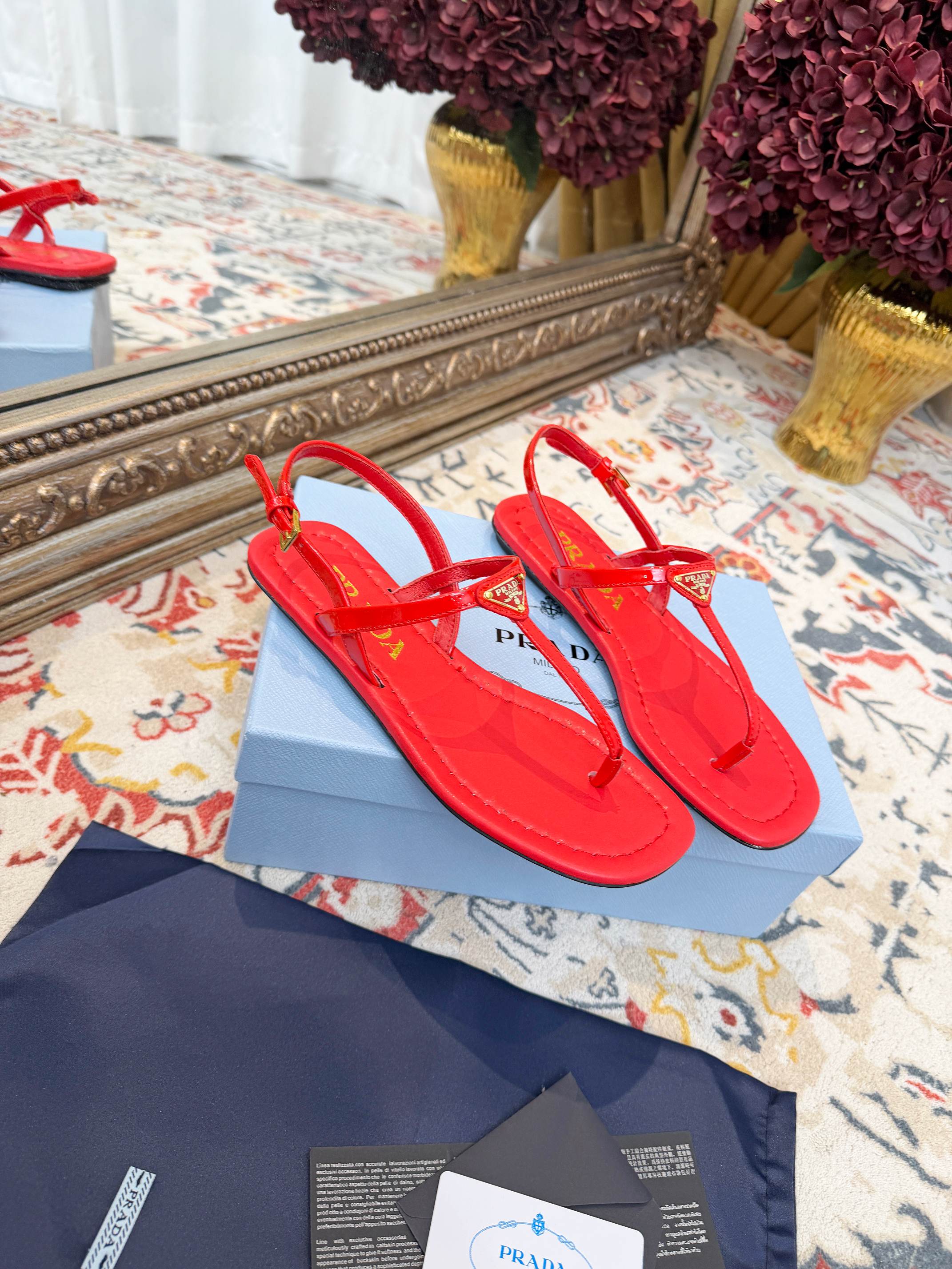 PRADA 26S THONG SANDALS IN RED CALFSKIN TRIANGLE LOGO