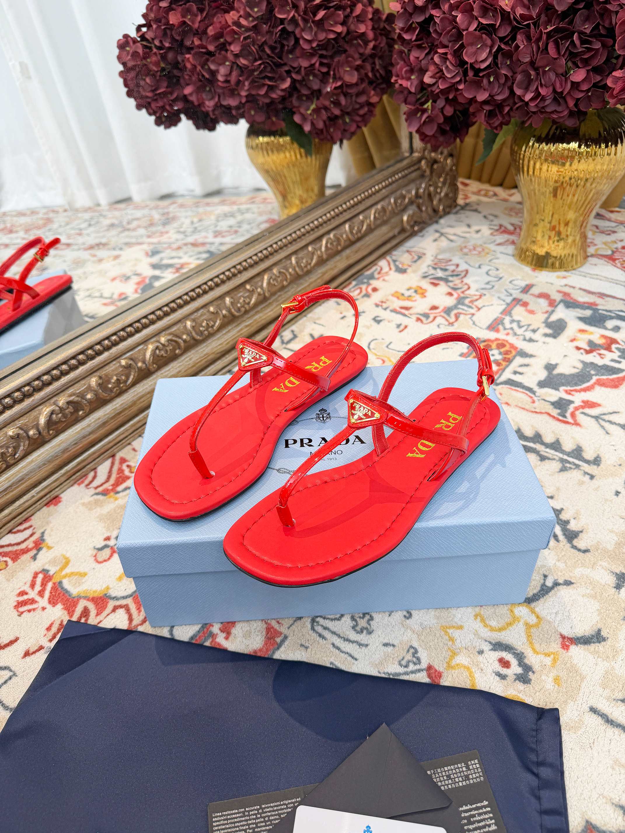 PRADA 26S THONG SANDALS IN RED CALFSKIN TRIANGLE LOGO
