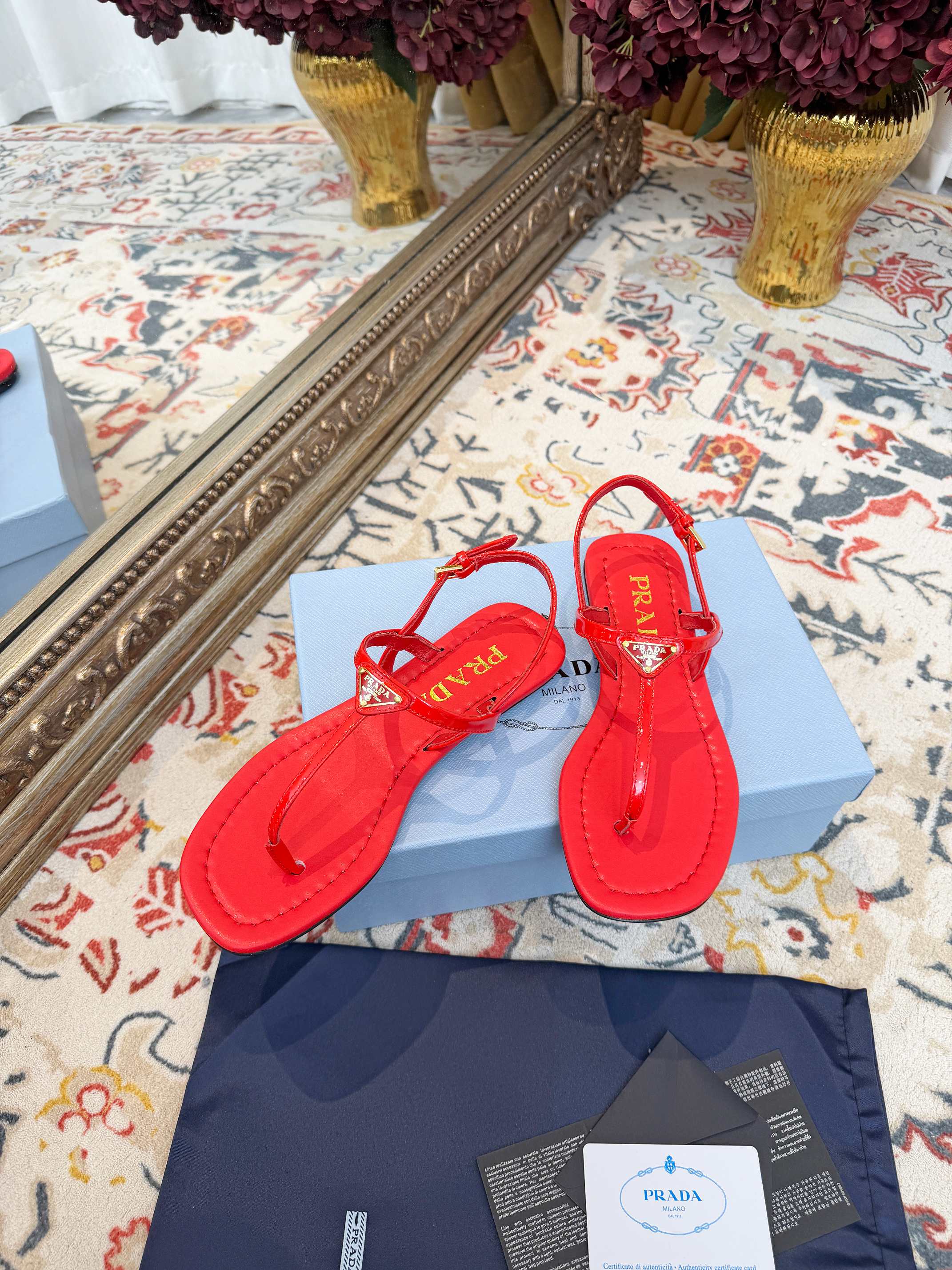 PRADA 26S THONG SANDALS IN RED CALFSKIN TRIANGLE LOGO