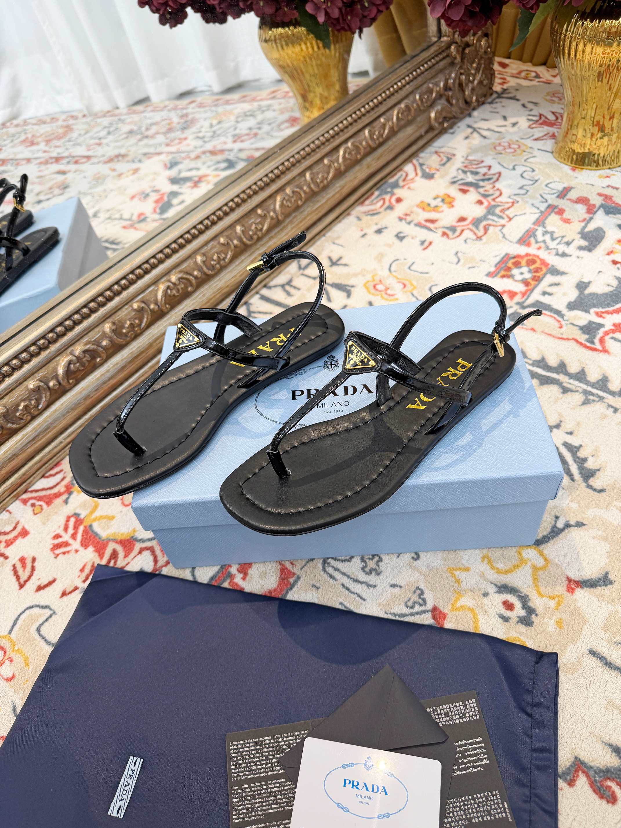 PRADA 26S THONG SANDALS IN BLACK CALFSKIN TRIANGLE LOGO