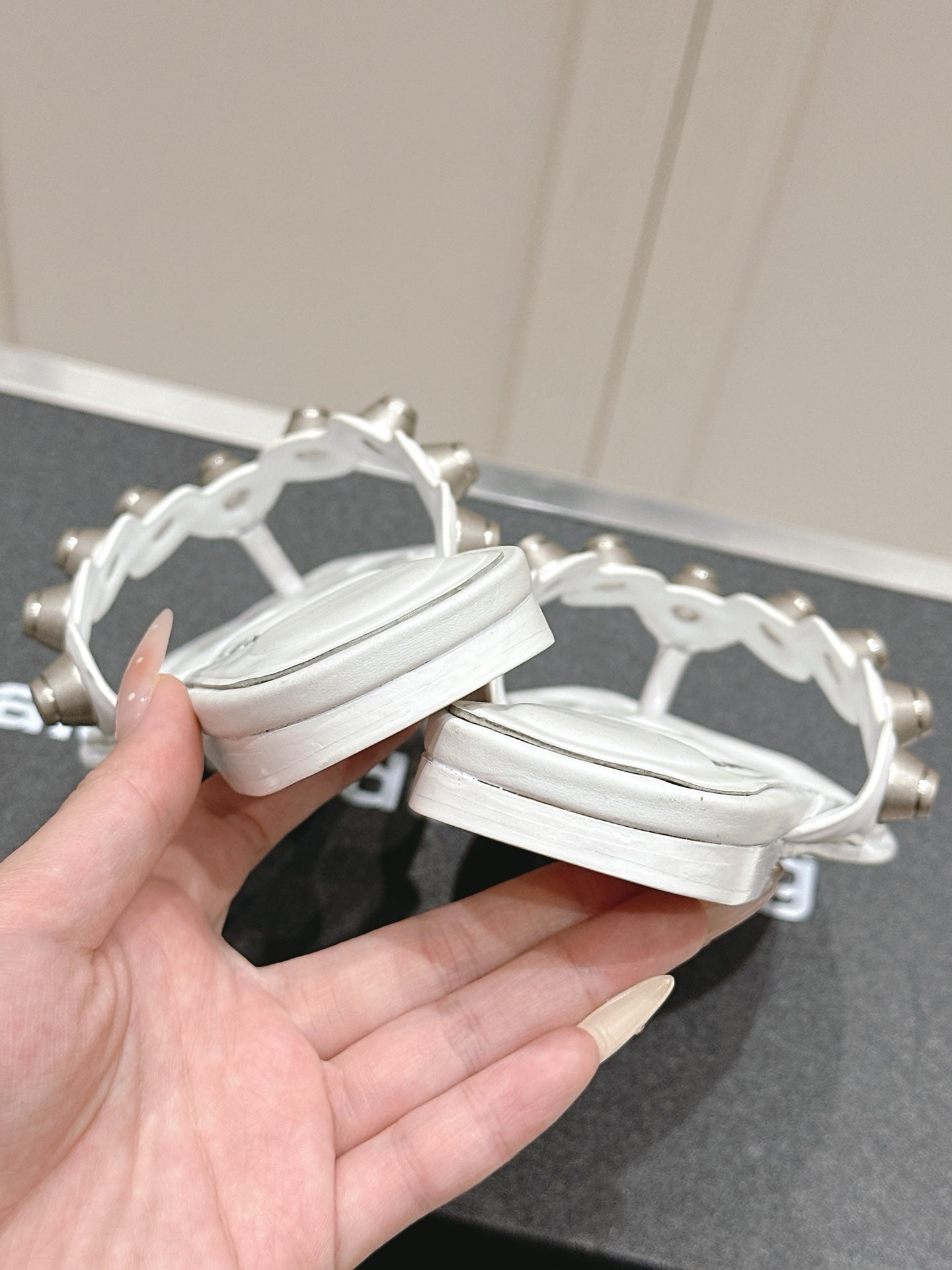 RHODES STUDDED THONG SANDALS IN WHITE CALFSKIN