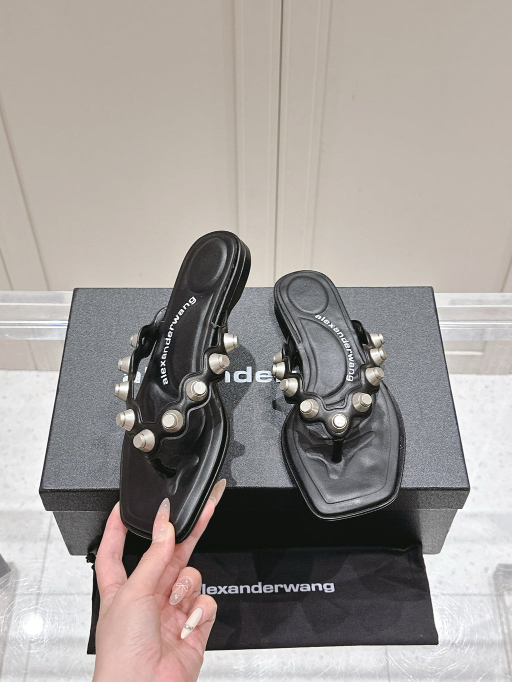 RHODES STUDDED THONG SANDALS IN BLACK CALFSKIN