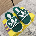GUCCI 26S PLATFORM SLIDE SANDALS IN GREEN FABRIC